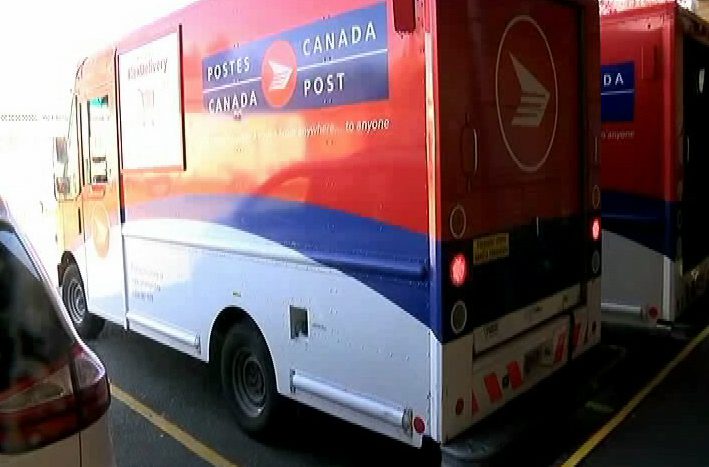 Canada Post warns of massive losses after back to work bill becomes law