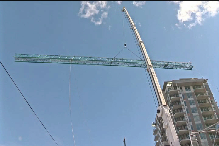 Mammoth crane dismantled in downtown Victoria