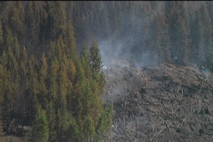 Fire crews try to contain Mount Arrowsmith fire