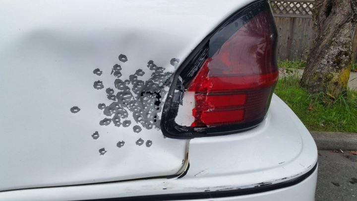 Bullet holes seen in a vehicle on Prideaux Street