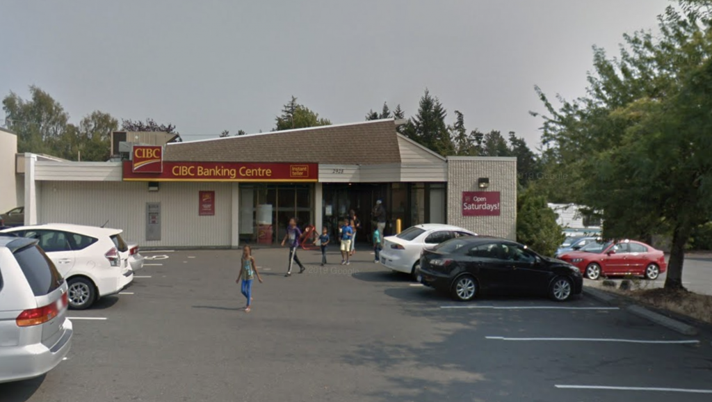 Saanich Police looking for witnesses after a man smashes bank window, pulls out knife