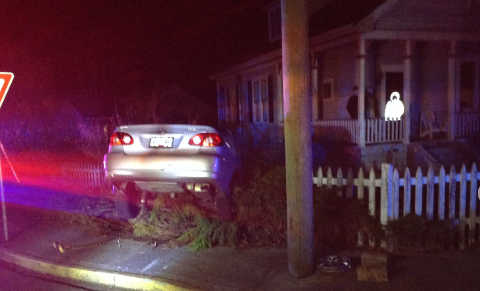 Motorist taken to hospital after crashing into Oak Bay home