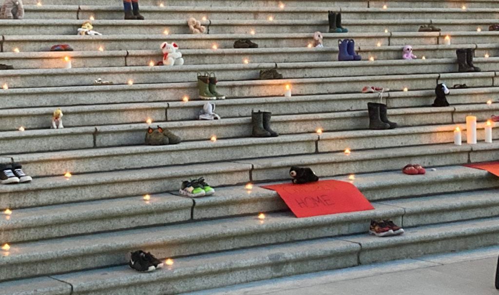 Legislative Assembly apologizes after candles extinguished, mementos collected from vigil for residential school victims