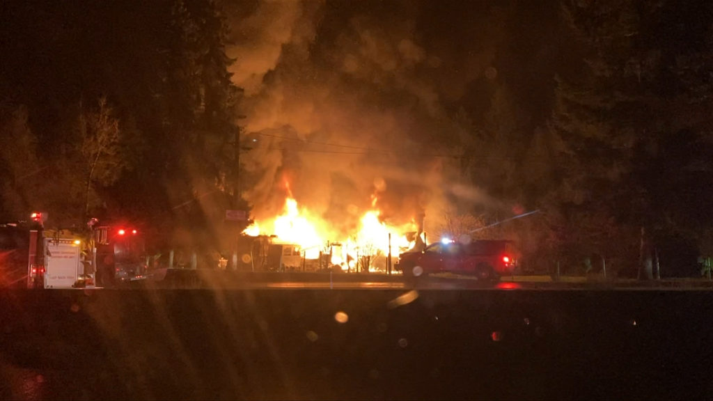 Two people taken to hospital after house fire near Chemainus