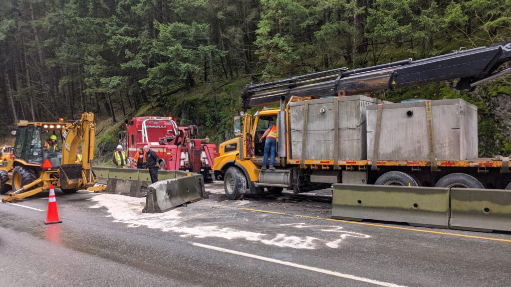 Traffic delays on Malahat after commercial truck plows into centre median