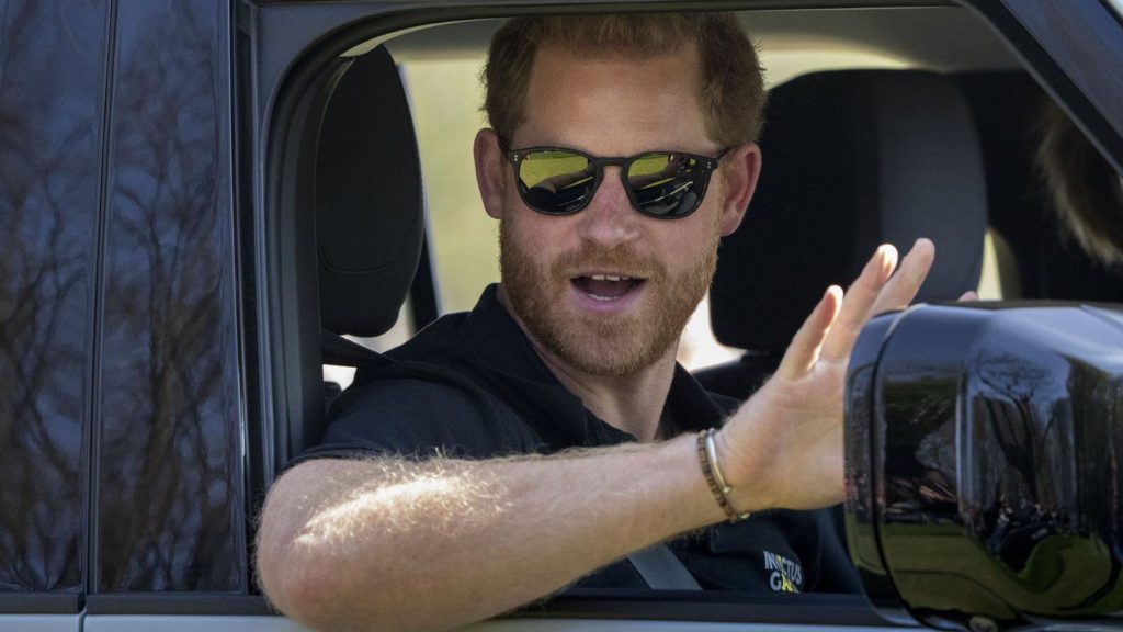 Drive time: Harry and Meghan ride in miniature Land Rovers