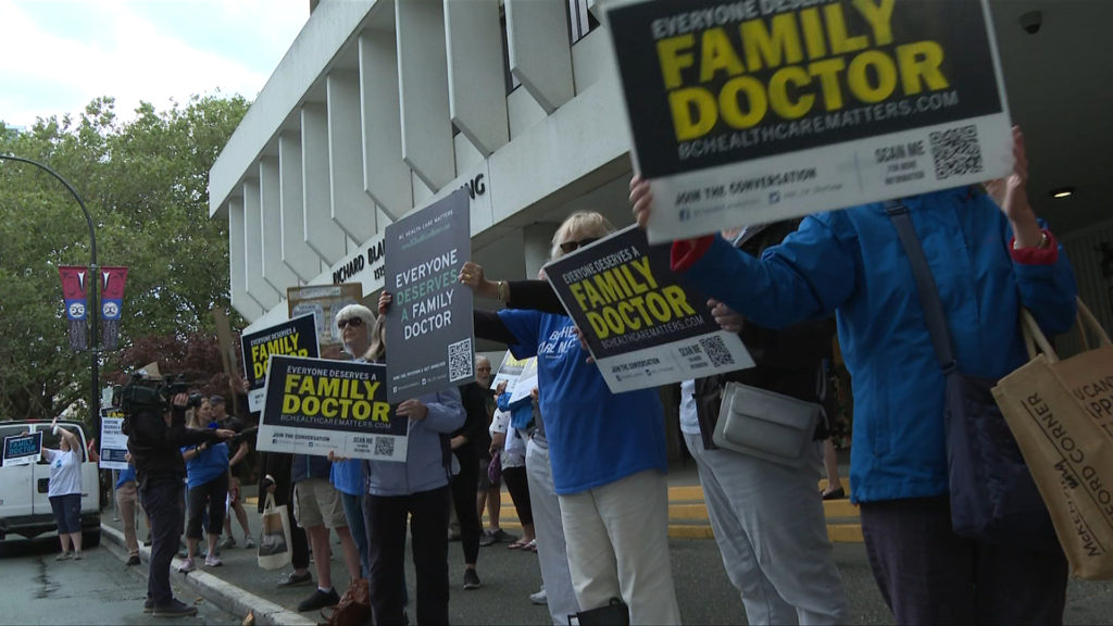 Group calling for action on family doctor shortage holds rally at Ministry of Health