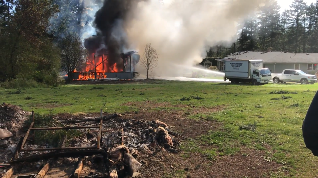 Crews battle 'significant' structure fire on Saanich property