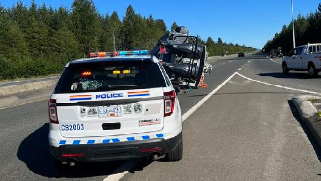 Boat on road cleared from highway near Campbell River Airport