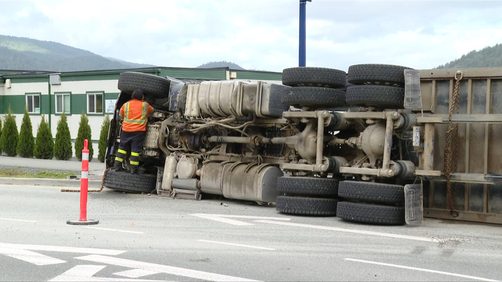 Truck driver in hospital, roundabout reopens after rollover crash in Langford: RCMP